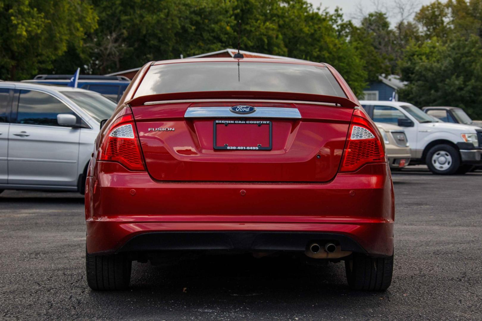 2012 RED FORD FUSION SEL (3FAHP0JA1CR) with an 2.5L L4 DOHC 16V engine, 5-SPEED AUTOMATIC OR 5-SPEED MANUAL transmission, located at 420 E. Kingsbury St., Seguin, TX, 78155, (830) 401-0495, 29.581060, -97.961647 - Photo#5