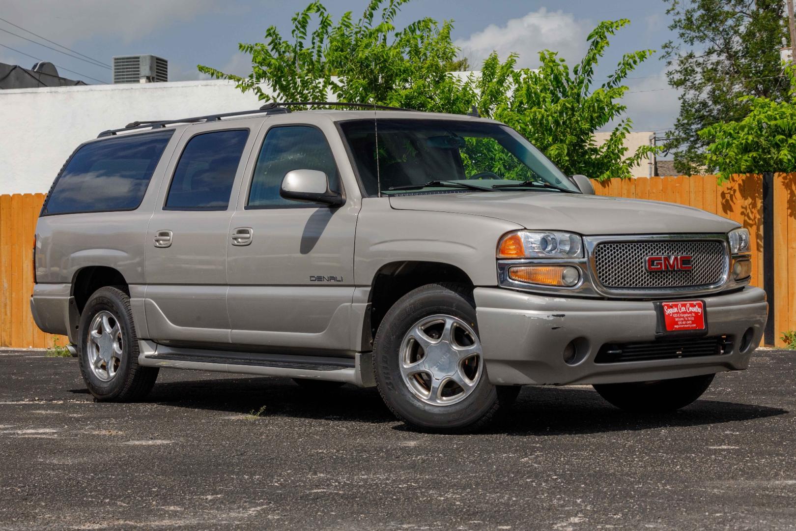 2006 SILVER GMC YUKON DENALI XL AWD (1GKFK66U66J) with an 6.0L V8 OHV 16V engine, 4-SPEED AUTOMATIC transmission, located at 420 E. Kingsbury St., Seguin, TX, 78155, (830) 401-0495, 29.581060, -97.961647 - Photo#0