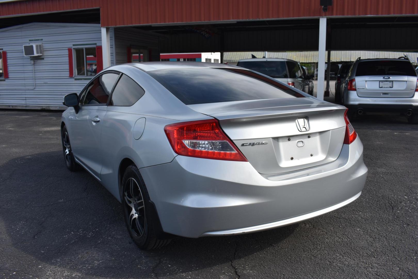 2012 /BLACK HONDA CIVIC EX Coupe 5-Speed AT (2HGFG3B58CH) with an 2.3L L4 SOHC 16V engine, 5-Speed Automatic transmission, located at 420 E. Kingsbury St., Seguin, TX, 78155, (830) 401-0495, 29.581060, -97.961647 - Photo#2