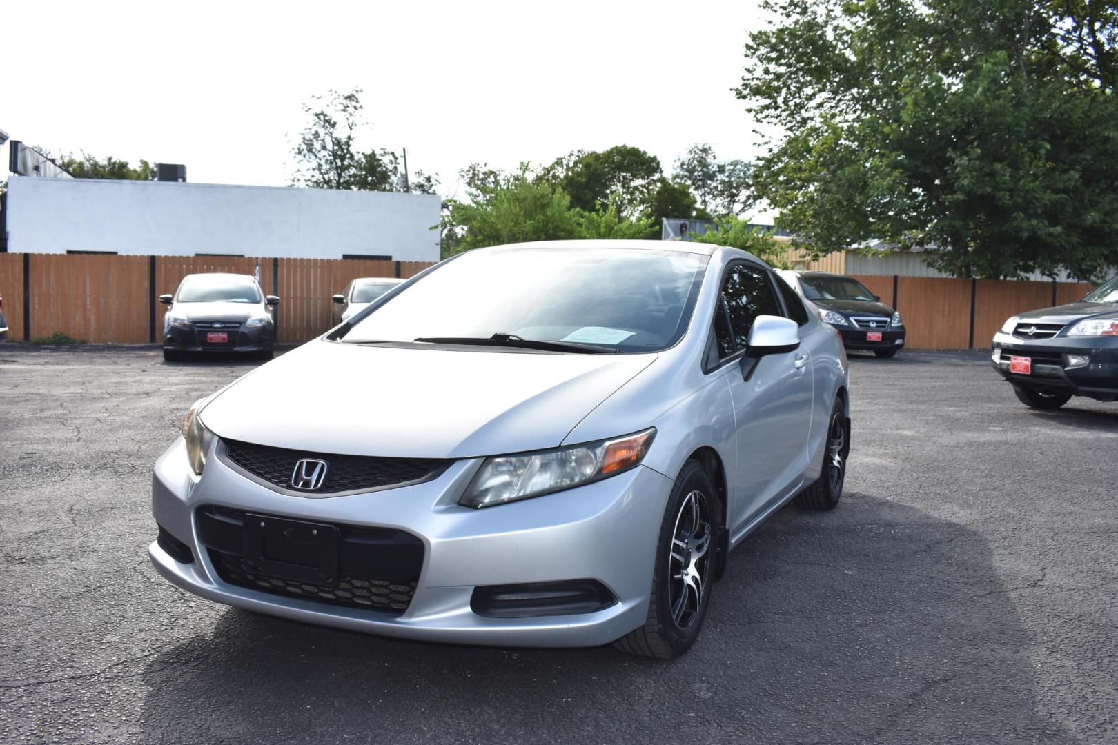 2012 /BLACK HONDA CIVIC EX Coupe 5-Speed AT (2HGFG3B58CH) with an 2.3L L4 SOHC 16V engine, 5-Speed Automatic transmission, located at 420 E. Kingsbury St., Seguin, TX, 78155, (830) 401-0495, 29.581060, -97.961647 - Photo#0