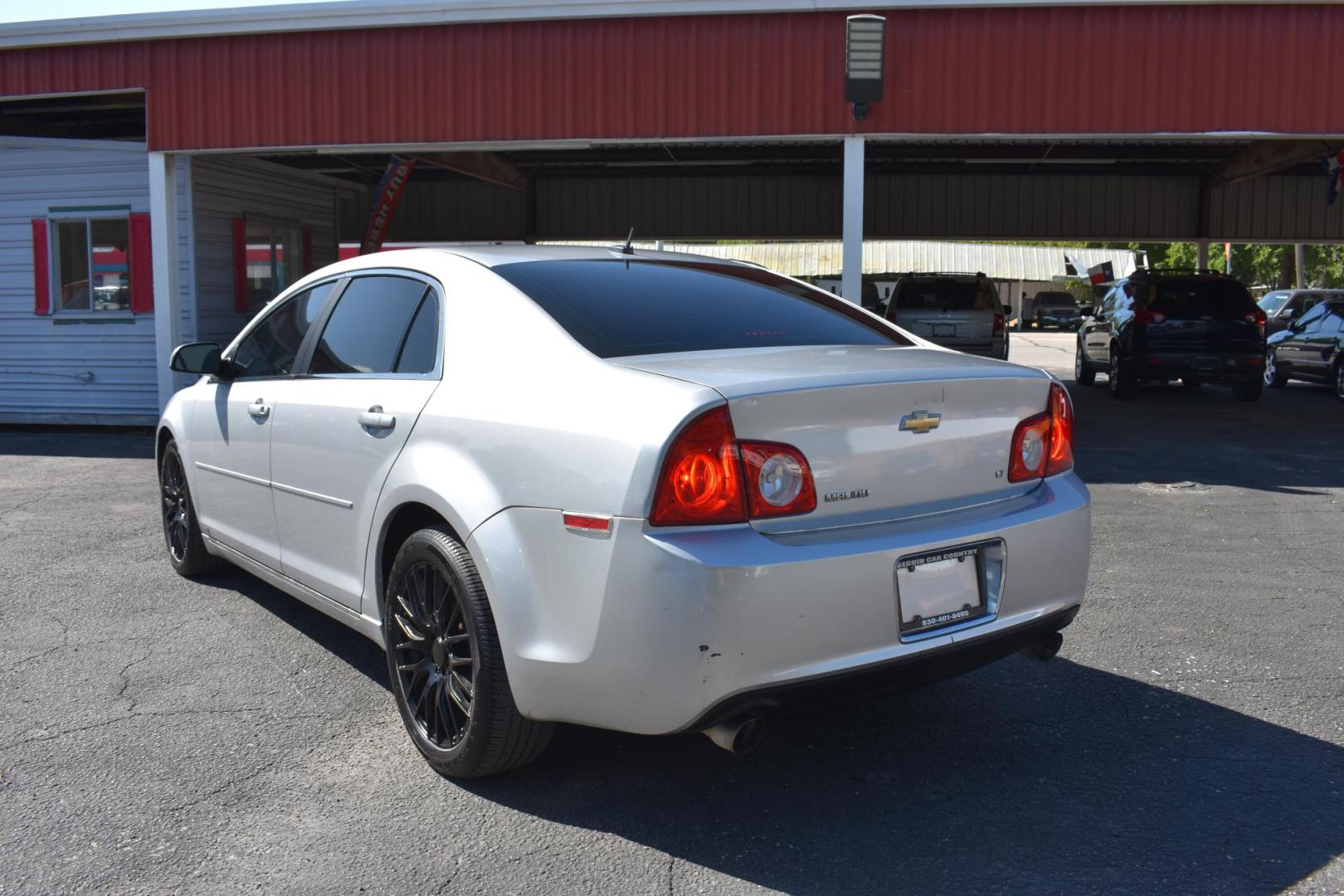 2009 /BLACK CHEVROLET MALIBU LT1 (1G1ZJ577894) with an 3.6L V6 DOHC 24V engine, 6-Speed Automatic transmission, located at 420 E. Kingsbury St., Seguin, TX, 78155, (830) 401-0495, 29.581060, -97.961647 - Photo#1