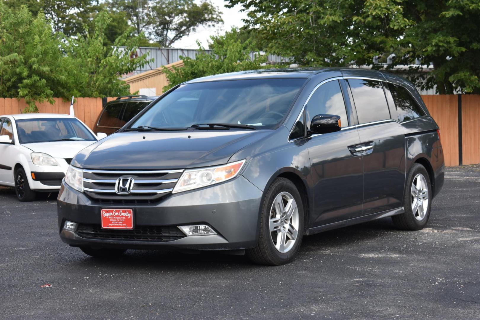 2012 Honda Odyssey Touring (5FNRL5H96CB) with an 3.5L V6 SOHC 24V engine, 5-Speed Automatic transmission, located at 420 E. Kingsbury St., Seguin, TX, 78155, (830) 401-0495, 29.581060, -97.961647 - Photo#1