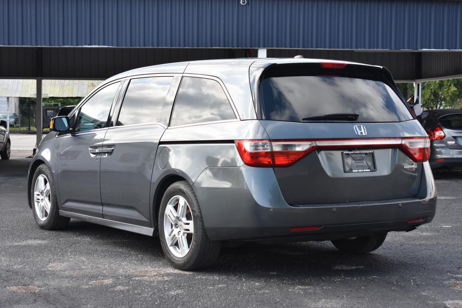 2012 Honda Odyssey Touring (5FNRL5H96CB) with an 3.5L V6 SOHC 24V engine, 5-Speed Automatic transmission, located at 420 E. Kingsbury St., Seguin, TX, 78155, (830) 401-0495, 29.581060, -97.961647 - Photo#2