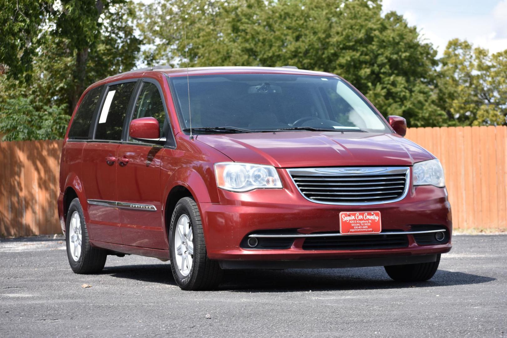 2012 RED Chrysler Town & Country Touring (2C4RC1BG3CR) with an 3.6L V6 DOHC 24V engine, 6-Speed Automatic transmission, located at 420 E. Kingsbury St., Seguin, TX, 78155, (830) 401-0495, 29.581060, -97.961647 - Photo#0