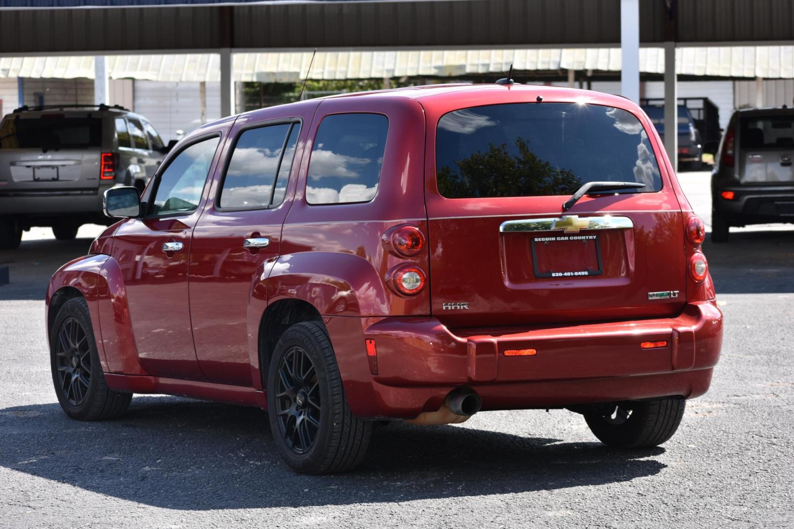 2010 RED Chevrolet HHR LT1 (3GNBABDV3AS) with an 2.4L L4 DOHC 16V FFV engine, 4-Speed Automatic transmission, located at 420 E. Kingsbury St., Seguin, TX, 78155, (830) 401-0495, 29.581060, -97.961647 - Photo#2