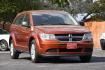 2013 ORANGE Dodge Journey SE (3C4PDCABXDT) with an 2.4L L4 DOHC 16V engine, 4-Speed Automatic transmission, located at 420 E. Kingsbury St., Seguin, TX, 78155, (830) 401-0495, 29.581060, -97.961647 - Photo#0