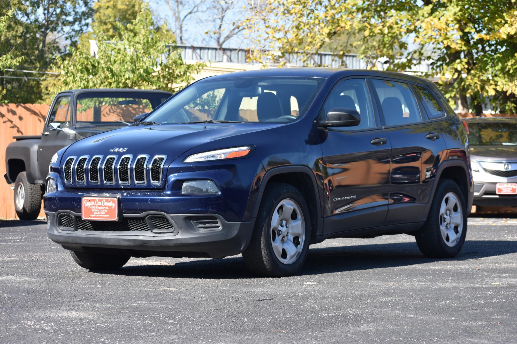 photo of 2015 Jeep Cherokee Sport FWD