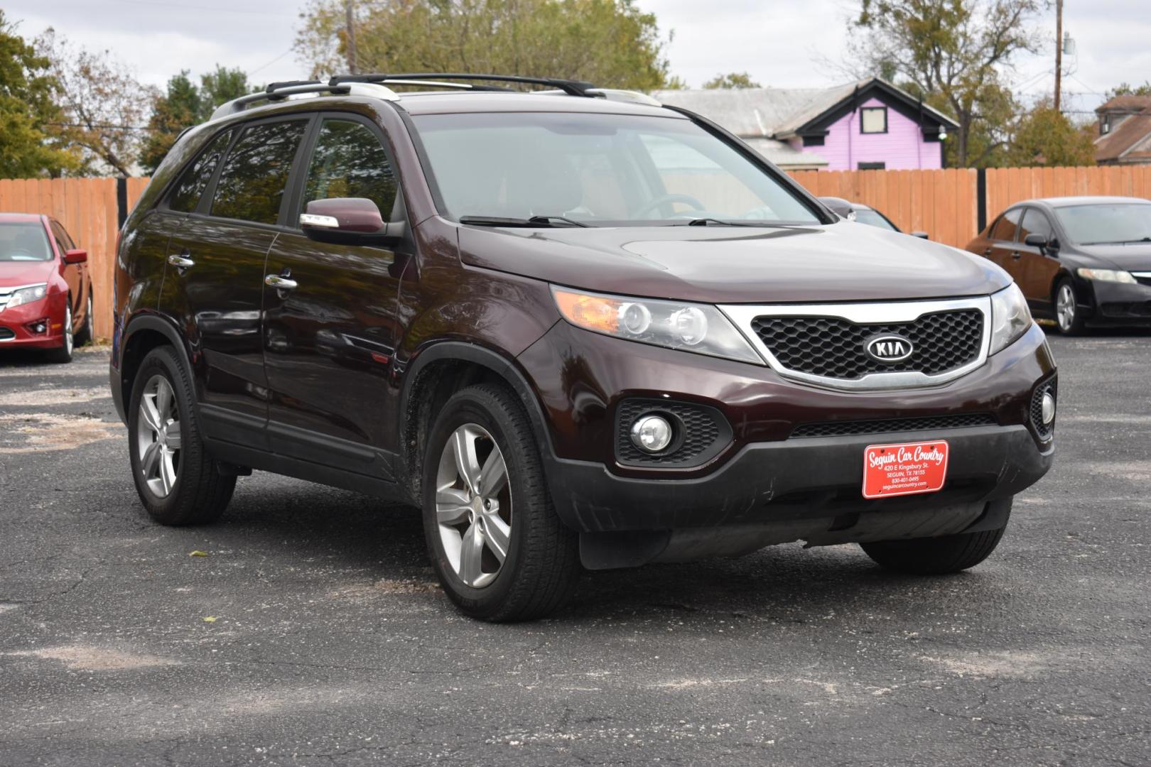 2013 MAROON Kia Sorento EX V6 2WD (5XYKU3A25DG) with an 3.5L V6 DOHC 24V engine, 6-Speed Automatic transmission, located at 420 E. Kingsbury St., Seguin, TX, 78155, (830) 401-0495, 29.581060, -97.961647 - Photo#0