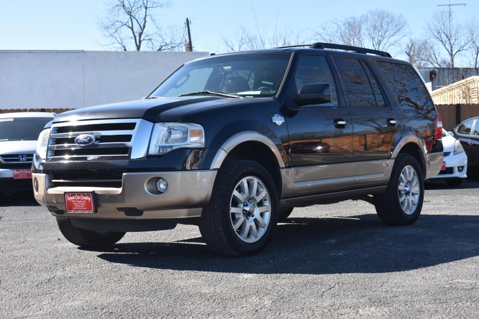 2012 BLACK Ford Expedition King Ranch 2WD (1FMJU1H51CE) with an 5.4L V8 SOHC 16V FFV engine, 6-Speed Automatic transmission, located at 420 E. Kingsbury St., Seguin, TX, 78155, (830) 401-0495, 29.581060, -97.961647 - Photo#1