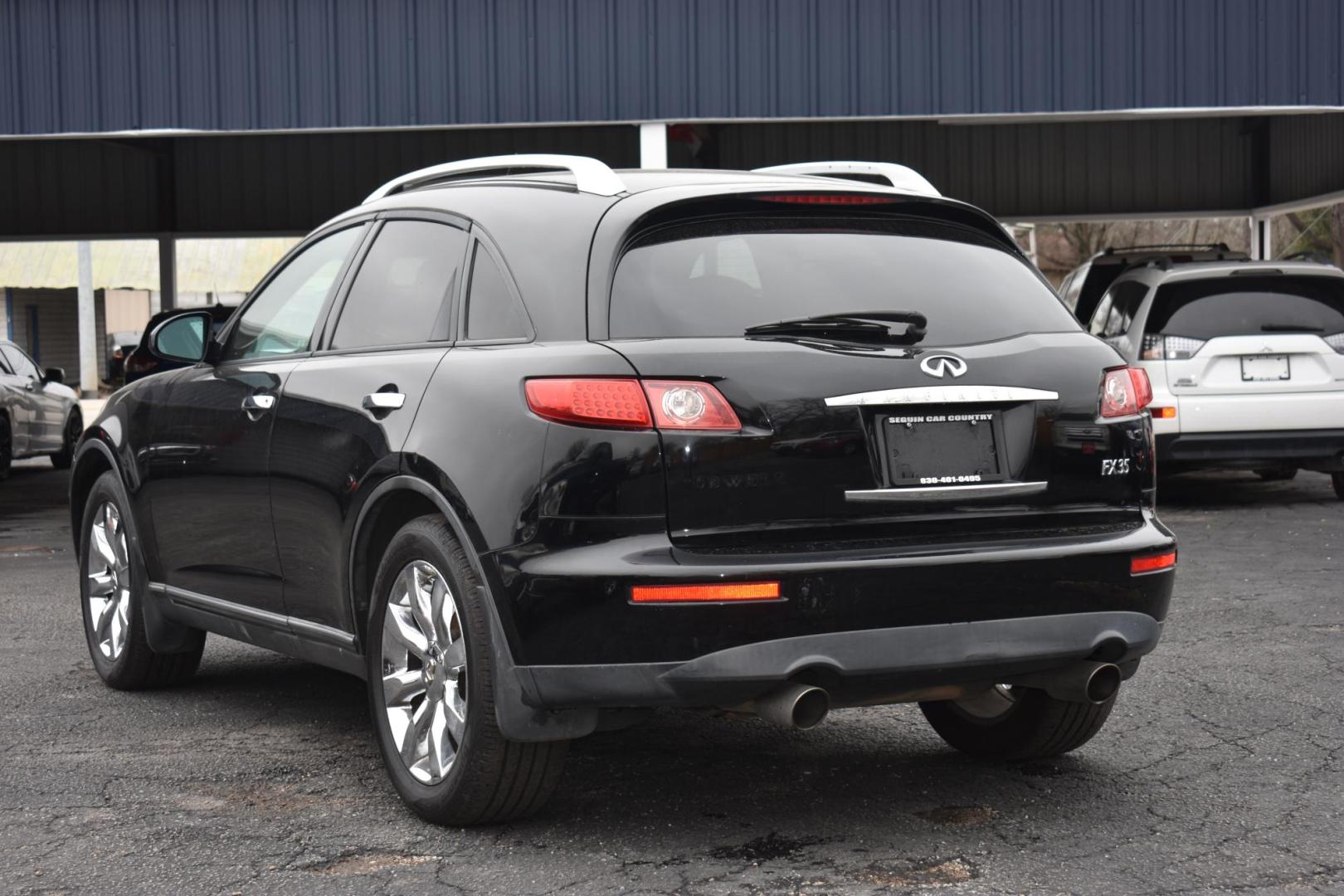 2004 BLACK Infiniti FX FX35 2WD (JNRAS08U94X) with an 3.5L V6 DOHC 32V engine, 5-Speed Automatic Overdrive transmission, located at 420 E. Kingsbury St., Seguin, TX, 78155, (830) 401-0495, 29.581060, -97.961647 - Photo#2